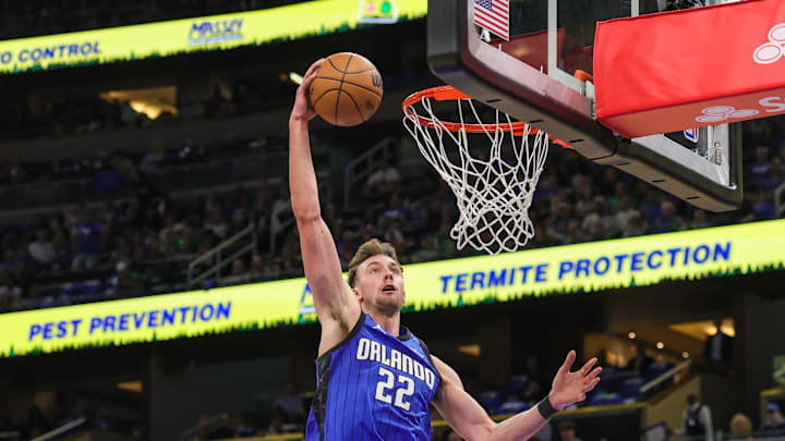 Apr 25, 2025; Orlando, Florida, USA; Orlando Magic forward Franz Wagner (22) dunks against the Boston Celtics during the second quarter of game three of first round for the 2024 NBA Playoffs at Kia Center. Mandatory Credit: Mike Watters-Imagn Images