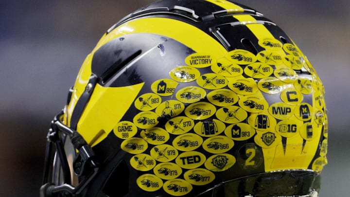 Dec 2, 2023; Indianapolis, IN, USA; The helmet of Michigan Wolverines running back Blake Corum (2) before the Big Ten Championship game against the Iowa Hawkeyes at Lucas Oil Stadium. Mandatory Credit: Trevor Ruszkowski-Imagn Images
