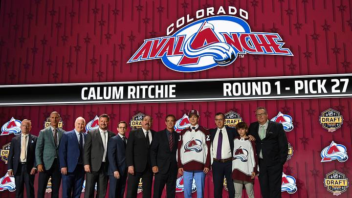 Jun 28, 2023; Nashville, Tennessee, USA; Colorado Avalanche draft pick Calum Ritchie stands with Ava staff after being selected with the thirty first pick in round one of the 2023 NHL Draft at Bridgestone Arena. Mandatory Credit: Christopher Hanewinckel-USA TODAY Sports Jun 28, 2023; Nashville, Tennessee, USA; Colorado Avalanche draft pick Calum Ritchie stands with Ava staff after being selected with the thirty first pick in round one of the 2023 NHL Draft at Bridgestone Arena. Mandatory Credit: Christopher Hanewinckel-USA TODAY Sports