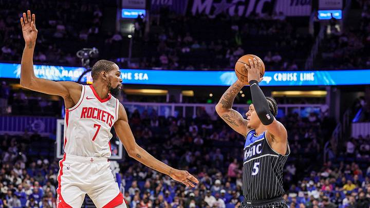 Feb 26, 2026; Orlando, Florida, USA; Orlando Magic forward Paolo Banchero (5) passes in front of Houston Rockets forward Kevin Durant (7) during the first quarter at Kia Center. Mandatory Credit: Mike Watters-Imagn Images Feb 26, 2026; Orlando, Florida, USA; Orlando Magic forward Paolo Banchero (5) passes in front of Houston Rockets forward Kevin Durant (7) during the first quarter at Kia Center. Mandatory Credit: Mike Watters-Imagn Images