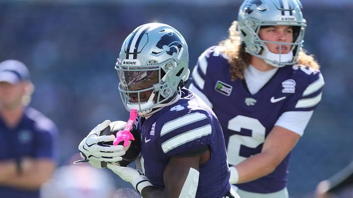 Kansas State Wildcats running back Joe Jackson (4) warms up with Kansas State Wildcats quarterback Avery Johnson (2) during the game inside Bill Snyder Family Stadium in Manhattan, Kansas, on Oct. 10, 2026. Kansas State Wildcats running back Joe Jackson (4) warms up with Kansas State Wildcats quarterback Avery Johnson (2) during the game inside Bill Snyder Family Stadium in Manhattan, Kansas, on Oct. 10, 2026.