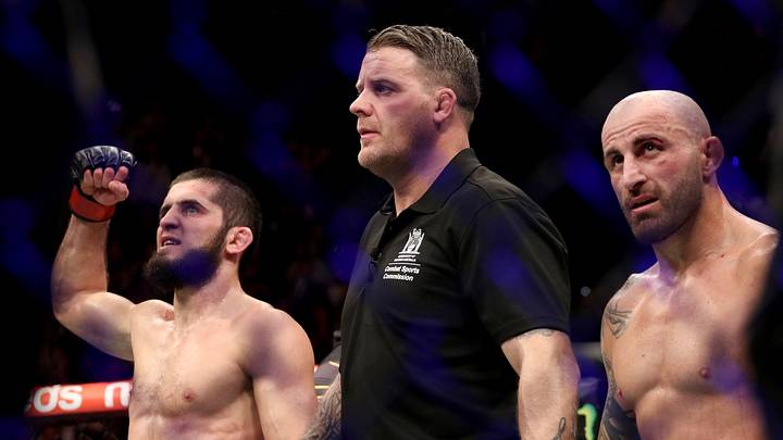 Feb 12, 2023; Perth, WA, AUSTRALIA; Islam Makhachev (red gloves) celebrates after defeating Alexander Volkanovski (blue gloves) for the lightweight championship during UFC 284 at RAC Arena. Mandatory Credit: Jasmin Frank-USA TODAY Sports Feb 12, 2023; Perth, WA, AUSTRALIA; Islam Makhachev (red gloves) celebrates after defeating Alexander Volkanovski (blue gloves) for the lightweight championship during UFC 284 at RAC Arena. Mandatory Credit: Jasmin Frank-USA TODAY Sports