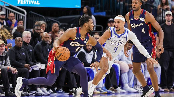 Mar 11, 2026; Orlando, Florida, USA; Orlando Magic guard Jalen Suggs (4) defends Cleveland Cavaliers guard Donovan Mitchell (45) during the first quarter at Kia Center. Mandatory Credit: Mike Watters-Imagn Images Mar 11, 2026; Orlando, Florida, USA; Orlando Magic guard Jalen Suggs (4) defends Cleveland Cavaliers guard Donovan Mitchell (45) during the first quarter at Kia Center. Mandatory Credit: Mike Watters-Imagn Images