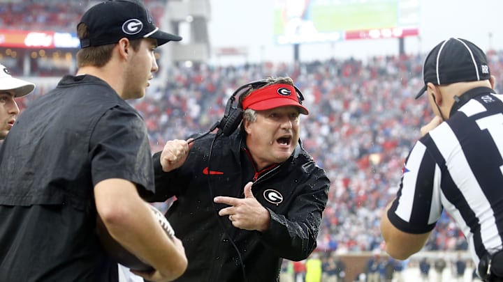 Nov 9, 2024; Oxford, Mississippi, USA; Georgia Bulldogs head coach Kirby Smart talks with an official during the first half against the Mississippi Rebels at Vaught-Hemingway Stadium. Mandatory Credit: Petre Thomas-Imagn Images