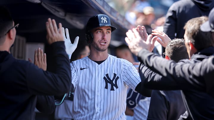 Apr 18, 2026; Bronx, New York, USA; New York Yankees center fielder Cody Bellinger (35) celebrates his two run home run against the Kansas City Royals in the dugout with teammates during the sixth inning at Yankee Stadium. Mandatory Credit: Brad Penner-Imagn Images