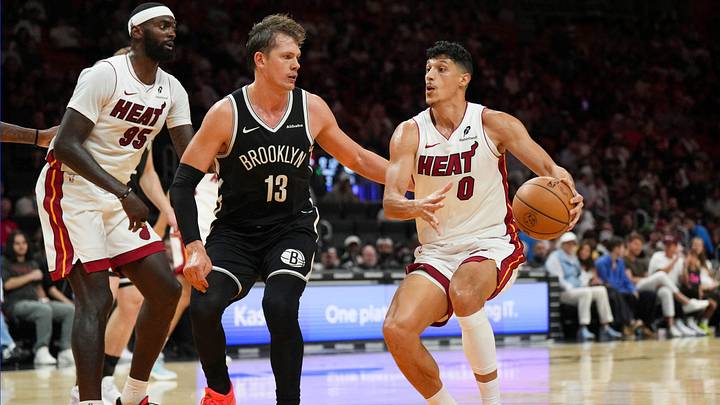 Oct 14, 2026; Miami, Florida, USA; Miami Heat forward Simone Fontecchio (0) drives to the basket as Brooklyn Nets center Moritz Wagner (13) defends during the second half at Kaseya Center. Mandatory Credit: Jim Rassol-Imagn Images Oct 14, 2026; Miami, Florida, USA; Miami Heat forward Simone Fontecchio (0) drives to the basket as Brooklyn Nets center Moritz Wagner (13) defends during the second half at Kaseya Center. Mandatory Credit: Jim Rassol-Imagn Images
