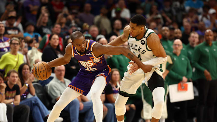 Mar 24, 2025; Phoenix, Arizona, USA; Milwaukee Bucks forward Giannis Antetokounmpo (34) defends against Phoenix Suns forward Kevin Durant (35) at Footprint Center. Mandatory Credit: Mark J. Rebilas-Imagn Images Mar 24, 2025; Phoenix, Arizona, USA; Milwaukee Bucks forward Giannis Antetokounmpo (34) defends against Phoenix Suns forward Kevin Durant (35) at Footprint Center. Mandatory Credit: Mark J. Rebilas-Imagn Images