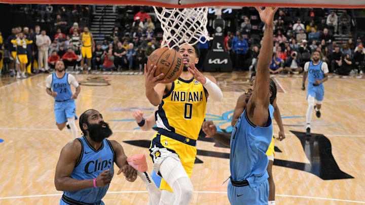 Feb 6, 2025; Inglewood, California, USA; Indiana Pacers guard Tyrese Haliburton (0) drives past Los Angeles Clippers forward Kawhi Leonard (2) and guard James Harden (1) in the second half at Intuit Dome. Mandatory Credit: Jayne Kamin-Oncea-Imagn Images Feb 6, 2025; Inglewood, California, USA; Indiana Pacers guard Tyrese Haliburton (0) drives past Los Angeles Clippers forward Kawhi Leonard (2) and guard James Harden (1) in the second half at Intuit Dome. Mandatory Credit: Jayne Kamin-Oncea-Imagn Images