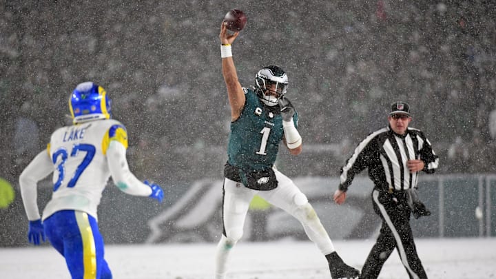 Jan 19, 2025; Philadelphia, Pennsylvania, USA; Philadelphia Eagles quarterback Jalen Hurts (1) throws a pass during the fourth quarter against the Los Angeles Rams in a 2025 NFC divisional round game at Lincoln Financial Field. Mandatory Credit: Eric Hartline-Imagn Images