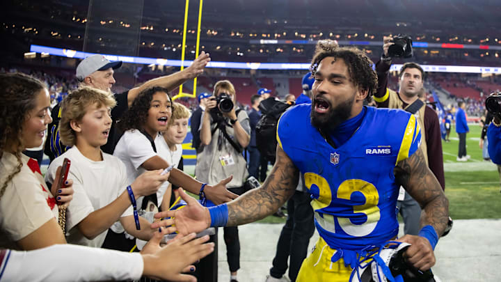 Jan 13, 2025; Glendale, AZ, USA; Los Angeles Rams running back Kyren Williams (23) celebrates after defeating the Minnesota Vikings during an NFC wild card game at State Farm Stadium. Mandatory Credit: Mark J. Rebilas-Imagn Images Jan 13, 2025; Glendale, AZ, USA; Los Angeles Rams running back Kyren Williams (23) celebrates after defeating the Minnesota Vikings during an NFC wild card game at State Farm Stadium. Mandatory Credit: Mark J. Rebilas-Imagn Images