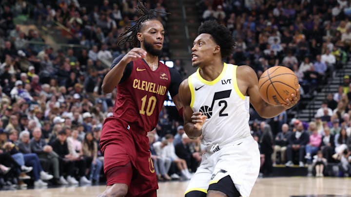 Apr 2, 2024; Salt Lake City, Utah, USA; Utah Jazz guard Collin Sexton (2) drives with the ball against Cleveland Cavaliers guard Darius Garland (10) during the fourth quarter at Delta Center. Mandatory Credit: Rob Gray-Imagn Images