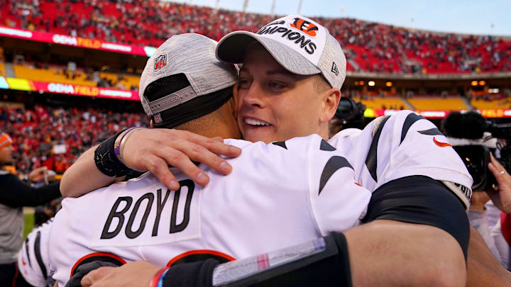 Cincinnati Bengals quarterback Joe Burrow (9) hugs Cincinnati Bengals wide receiver Tyler Boyd (83) at the conclusion of the AFC championship NFL football game, Sunday, Jan. 30, 2022, at GEHA Field at Arrowhead Stadium in Kansas City, Mo. The Cincinnati Bengals defeated the Kansas City Chiefs, 27-24, to advance to the Super Bowl.

Cincinnati Bengals At Kansas City Chiefs Jan 30 Afc Championship 752