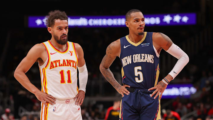 Dec 2, 2024; Atlanta, Georgia, USA; Atlanta Hawks guard Trae Young (11) and New Orleans Pelicans guard Dejounte Murray (5) on the court in the second quarter at State Farm Arena. Mandatory Credit: Brett Davis-Imagn Images
Dec 2, 2024; Atlanta, Georgia, USA; Atlanta Hawks guard Trae Young (11) and New Orleans Pelicans guard Dejounte Murray (5) on the court in the second quarter at State Farm Arena. Mandatory Credit: Brett Davis-Imagn Images