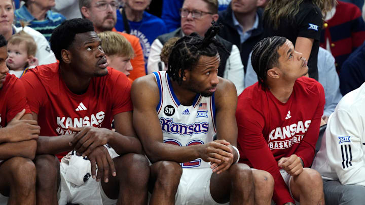 Kansas Jayhawks guard Darryn Peterson (22) sits on th bench in the second half of a men's college basketball game between the Oklahoma State Cowboys and the Kansas Jayhawks at Gallagher-Iba Arena in Stillwater, Okla., Wednesday, Feb. 18, 2026.
