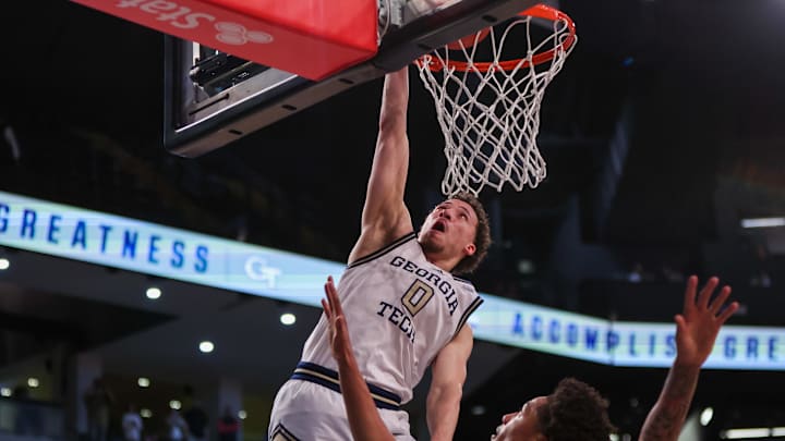 Mar 4, 2025; Atlanta, Georgia, USA; Georgia Tech Yellow Jackets guard Lance Terry (0) dunks against the Miami Hurricanes in the second half at McCamish Pavilion. Mandatory Credit: Brett Davis-Imagn Images
