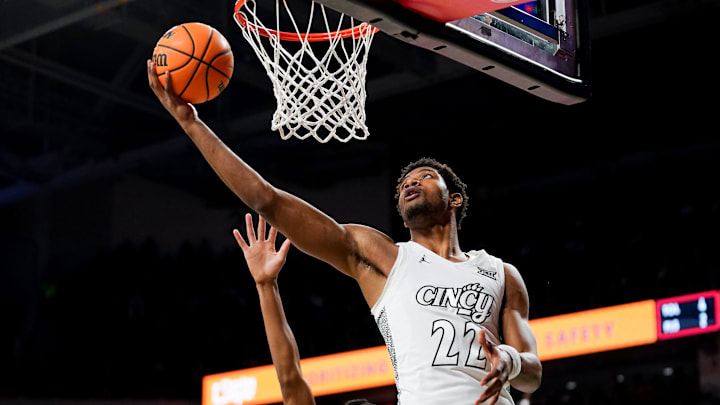 Cincinnati Bearcats forward Arrinten Page (22) hits a layup in the first half of a NCAA men’s basketball game between the Cincinnati Bearcats and Texas Tech Red Raiders, Tuesday, Jan. 21, 2025, at Fifth Third Arena in Cincinnati Cincinnati Bearcats forward Arrinten Page (22) hits a layup in the first half of a NCAA men’s basketball game between the Cincinnati Bearcats and Texas Tech Red Raiders, Tuesday, Jan. 21, 2025, at Fifth Third Arena in Cincinnati