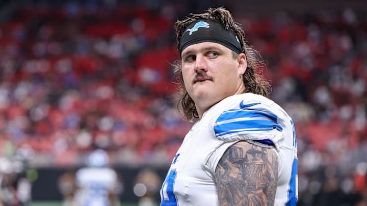 Aug 8, 2025; Atlanta, Georgia, USA; Detroit Lions guard Tate Ratledge (69) after an injury to safety Morice Norris (not pictured) against the Atlanta Falcons in the fourth quarter at Mercedes-Benz Stadium. Mandatory Credit: Brett Davis-Imagn Images