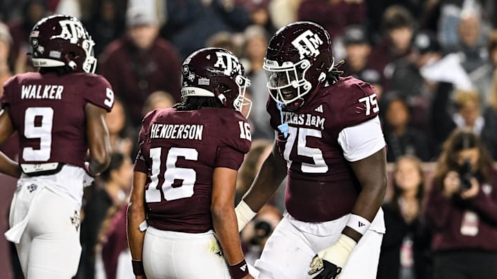Nov 11, 2023; College Station, Texas, USA; Texas A&M Aggies offensive lineman Kam Dewberry (75) celebrates with quarterback Jaylen Henderson (16) after a touchdown during the first quarter against the Mississippi State Bulldogs at Kyle Field. Mandatory Credit: Maria Lysaker-Imagn Images Nov 11, 2023; College Station, Texas, USA; Texas A&M Aggies offensive lineman Kam Dewberry (75) celebrates with quarterback Jaylen Henderson (16) after a touchdown during the first quarter against the Mississippi State Bulldogs at Kyle Field. Mandatory Credit: Maria Lysaker-Imagn Images