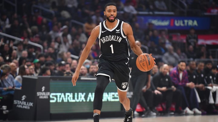 Jan 21, 2024; Los Angeles, California, USA; Brooklyn Nets forward Mikal Bridges (1) moves the ball against the Los Angeles Clippers during the first half at Crypto.com Arena. Mandatory Credit: Gary A. Vasquez-USA TODAY Sports