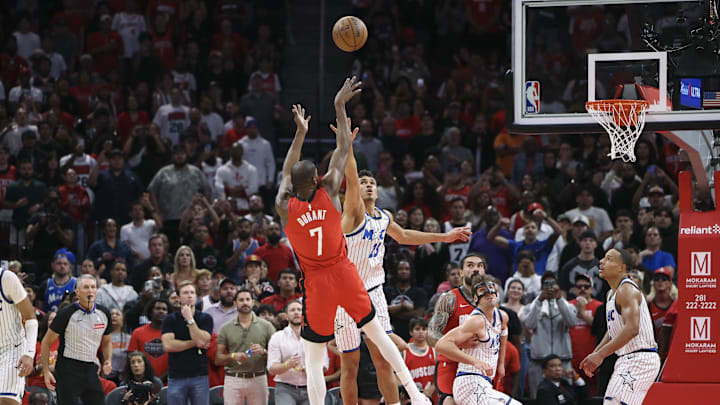 Nov 16, 2025; Houston, Texas, USA; Houston Rockets forward Kevin Durant (7) makes a basket as Orlando Magic forward Tristan da Silva (23) defends during overtime at Toyota Center. Mandatory Credit: Troy Taormina-Imagn Images