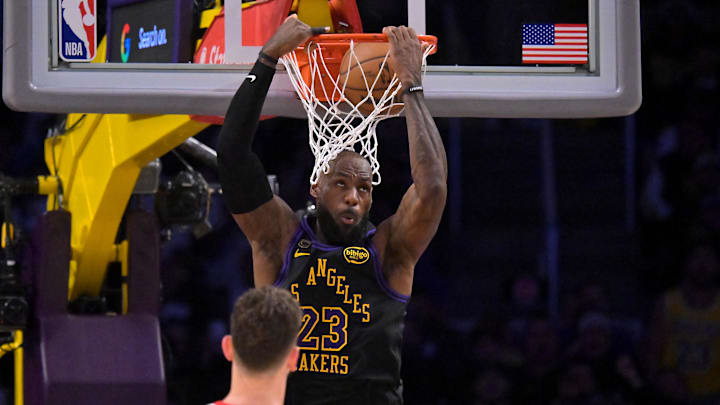 Lakers forward LeBron James dunks against the Rockets in Game 2 of their first-round NBA playoffs series.