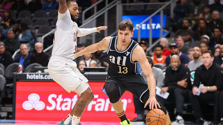 Mar 6, 2024; Atlanta, Georgia, USA; Atlanta Hawks guard Bogdan Bogdanovic (13) drives to the basket against the Cleveland Cavaliers in the second half at State Farm Arena. Mandatory Credit: Brett Davis-Imagn Images