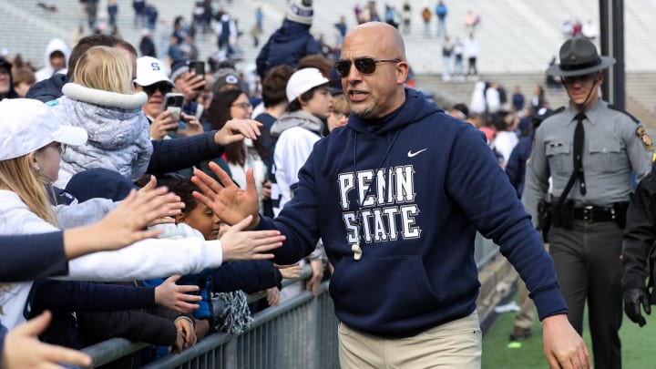 Penn State football coach James Franklin shakes hands with fans following the Blue-White Game at Beaver Stadium. 