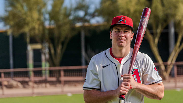 Feb 19, 2025; Scottsdale, AZ, USA; Arizona Diamondbacks outfielder Jake McCarthy (31) poses for a portrait for MLB Media Day at Salt River Fields.  Mandatory Credit: Allan Henry-Imagn Images
