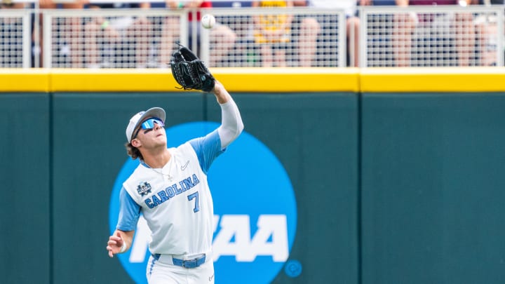Jun 18, 2024; Omaha, NE, USA; North Carolina Tar Heels center fielder Vance Honeycutt (7) catches a fly ball for an out against the Florida State Seminoles during the fifth inning at Charles Schwab Field Omaha. 