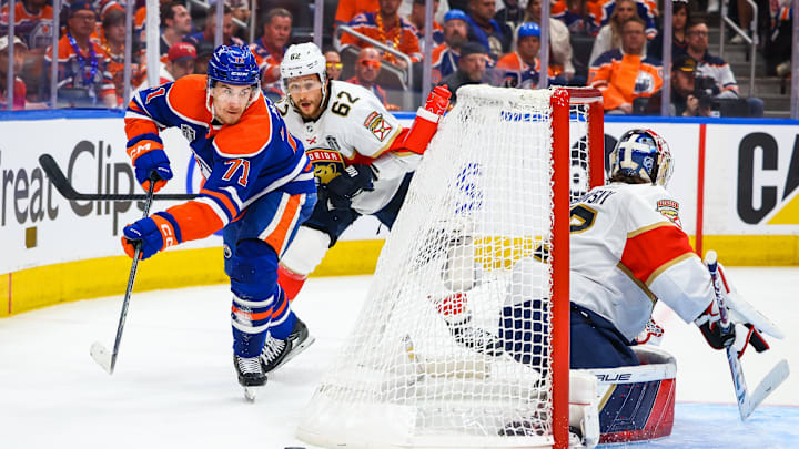 Jun 21, 2024; Edmonton, Alberta, CAN; Edmonton Oilers center Ryan McLeod (71) passes the puck against the Florida Panthers during the second period in game six of the 2024 Stanley Cup Final at Rogers Place. Mandatory Credit: Sergei Belski-USA TODAY Sports