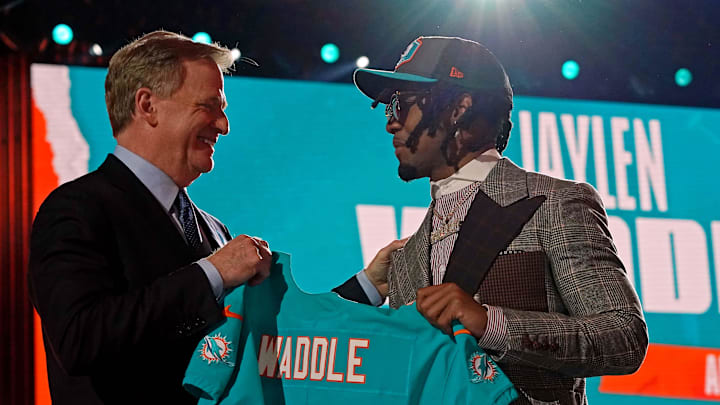 Apr 29, 2021; Cleveland, Ohio, USA; Jaylen Waddle (Alabama) with NFL commissioner Roger Goodell