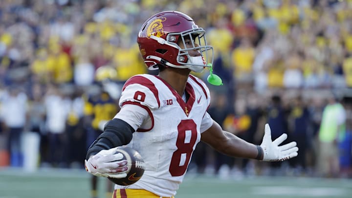 Sep 21, 2024; Ann Arbor, Michigan, USA;  USC Trojans wide receiver Ja'Kobi Lane (8) celebrates a touchdown in the second half against the Michigan Wolverines at Michigan Stadium. Mandatory Credit: Rick Osentoski-Imagn Images