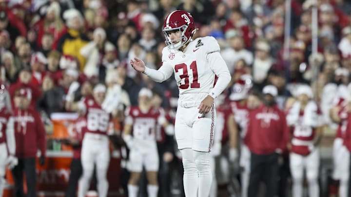 Dec 19, 2025; Norman, OK, USA; Alabama Crimson Tide kicker Conor Talty (31) lines up in the first half against the Oklahoma Sooners at Gaylord Family OK Memorial Stadium.