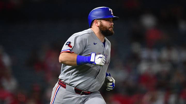 Aug 10, 2026; Anaheim, California, USA; Texas Rangers first baseman Jake Burger (21) runs after hitting a two run RBI single against the Los Angeles Angels during the tenth inning at Angel Stadium. Mandatory Credit: Gary A. Vasquez-Imagn Images Aug 10, 2026; Anaheim, California, USA; Texas Rangers first baseman Jake Burger (21) runs after hitting a two run RBI single against the Los Angeles Angels during the tenth inning at Angel Stadium. Mandatory Credit: Gary A. Vasquez-Imagn Images