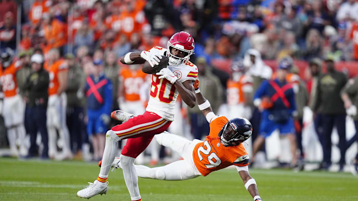 Nov 16, 2025; Denver, Colorado, USA; Kansas City Chiefs wide receiver Tyquan Thornton (80) catches the ball past Denver Broncos cornerback Ja'Quan McMillian (29) in the third quarter at Empower Field at Mile High. Mandatory Credit: Ron Chenoy-Imagn Images