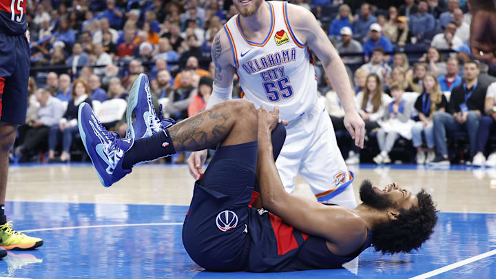 Dec 23, 2024; Oklahoma City, Oklahoma, USA; Washington Wizards forward Marvin Bagley III (35) reacts after hurting his leg on a play against the Oklahoma City Thunder during the second half at Paycom Center. Mandatory Credit: Alonzo Adams-Imagn Images