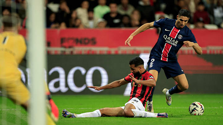 Achraf Hakimi evading Ali Abdi's tackle