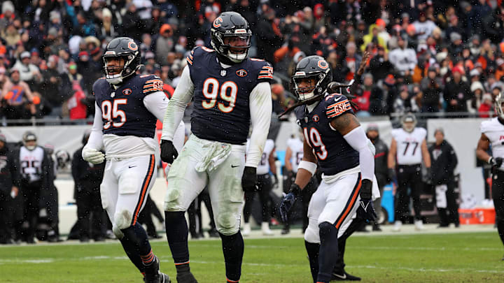 Dec 31, 2023; Chicago, Illinois, USA; Chicago Bears defensive tackle Gervon Dexter Sr. (99) reacts