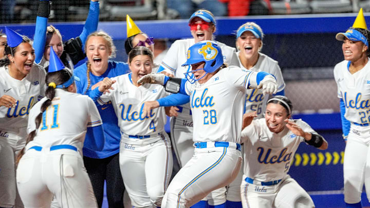 UCLA catcher Alexis Ramirez (28) runs home after hitting a home run in the fourth inning during a softball game between UCLA and Oregon at the Women’s College World Series at Devon Park in Oklahoma City, on Thursday, May 29, 2025.