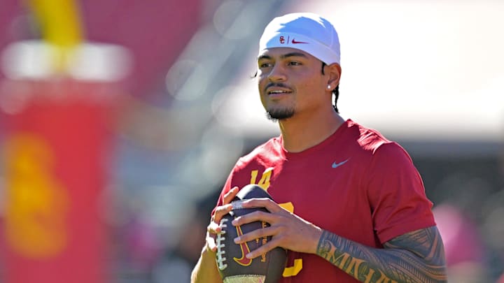 Oct 11, 2025; Los Angeles, California, USA; USC Trojans quarterback Jayden Maiava (14) warms up prior to the game against the Michigan Wolverines at United Airlines Field at the Los Angeles Memorial Coliseum. Mandatory Credit: Jayne Kamin-Oncea-Imagn Images Oct 11, 2025; Los Angeles, California, USA; USC Trojans quarterback Jayden Maiava (14) warms up prior to the game against the Michigan Wolverines at United Airlines Field at the Los Angeles Memorial Coliseum. Mandatory Credit: Jayne Kamin-Oncea-Imagn Images