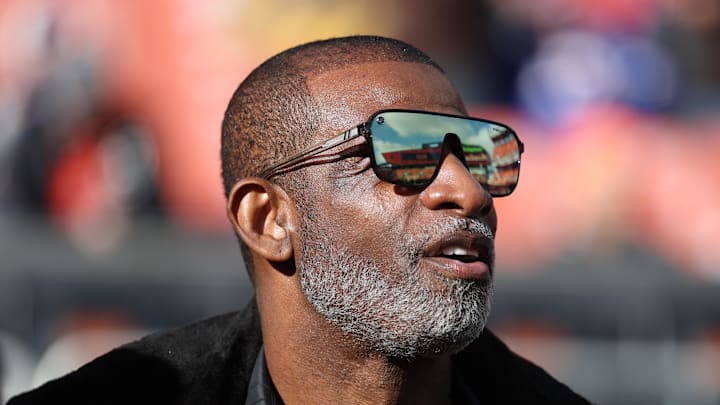 Dec 21, 2025; Cleveland, Ohio, USA;  Legendary  football and baseball player and father of Cleveland Browns quarterback Shedeur Sanders, Deion Sanders on the sidelines prior to a game against the Buffalo Bills at Huntington Bank Field. 