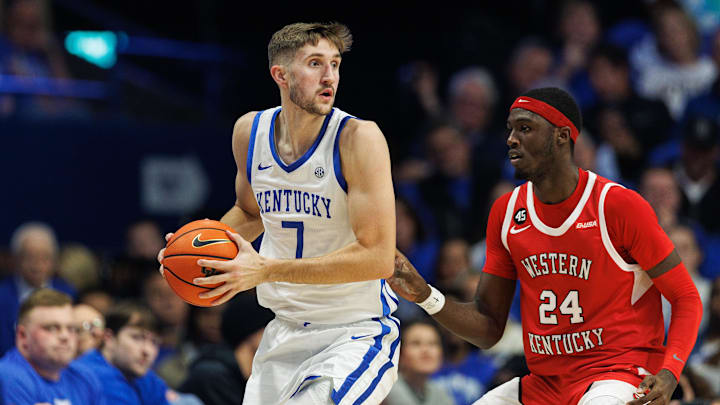 Nov 26, 2024; Lexington, Kentucky, USA; Kentucky Wildcats forward Andrew Carr (7) holds the ball during the first half against the Western Kentucky Hilltoppers at Rupp Arena at Central Bank Center. Mandatory Credit: Jordan Prather-Imagn Images