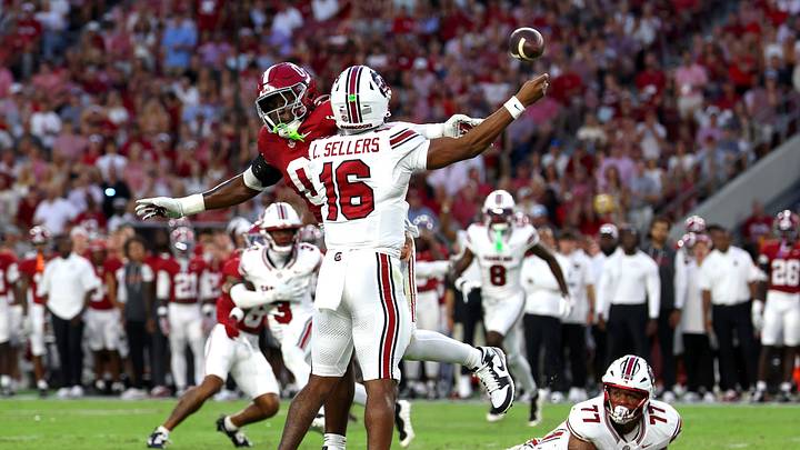 Sep 26, 2026; Tuscaloosa, Alabama, USA; South Carolina Gamecocks quarterback LaNorris Sellers (16) is pressured by Alabama Crimson Tide linebacker Yhonzae Pierre (0) during the first quarter at Saban Field at Bryant-Denny Stadium. Mandatory Credit: David Leong-Imagn Images Sep 26, 2026; Tuscaloosa, Alabama, USA; South Carolina Gamecocks quarterback LaNorris Sellers (16) is pressured by Alabama Crimson Tide linebacker Yhonzae Pierre (0) during the first quarter at Saban Field at Bryant-Denny Stadium. Mandatory Credit: David Leong-Imagn Images