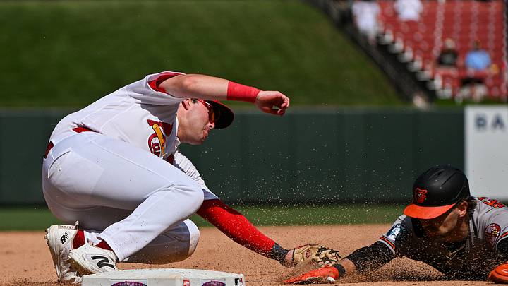 Aug 27, 2026; St. Louis, Missouri, USA; St. Louis Cardinals third baseman Blaze Jordan (33) injuries his ankle as he tags out Baltimore Orioles shortstop Gunnar Henderson (2) during the eighth inning at Busch Stadium. Mandatory Credit: Jeff Curry-Imagn Images