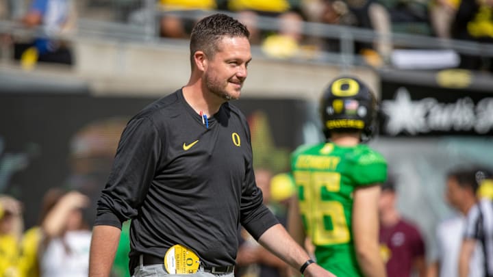 Oregon head coach Dan Lanning walks the field during warm ups as the Oregon Ducks host Colorado in