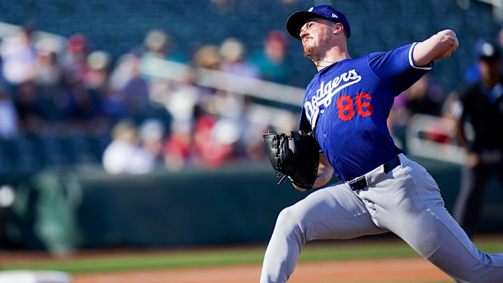 Los Angeles Dodgers pitcher Jack Dreyer (86) throws a pitch in the eighth inning of a Cactus League game between the Cincinnati Reds and Los Angeles Dodgers, Monday, Feb. 24, 2025, at Goodyear Ballpark in Goodyear, Ariz. Reds won 8-1.