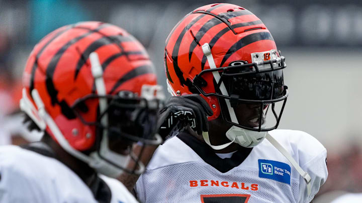 Cincinnati Bengals wide receiver Tee Higgins (5) and wide receiver Ja'Marr Chase (1) line up between