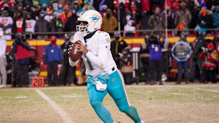 Jan 13, 2024; Kansas City, Missouri, USA; Miami Dolphins quarterback Tua Tagovailoa (1) against the Kansas City Chiefs in a 2024 AFC wild card game at GEHA Field at Arrowhead Stadium. Mandatory Credit: Denny Medley-USA TODAY Sports