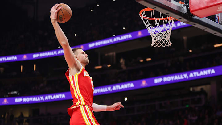 Dec 5, 2025; Atlanta, Georgia, USA; Atlanta Hawks center Kristaps Porzingis (8) dunks against the Denver Nuggets in the second quarter at State Farm Arena. Dec 5, 2025; Atlanta, Georgia, USA; Atlanta Hawks center Kristaps Porzingis (8) dunks against the Denver Nuggets in the second quarter at State Farm Arena.