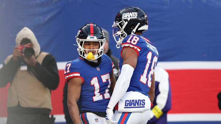 Dec 14, 2025; East Rutherford, New Jersey, USA; New York Giants wide receiver Wan'Dale Robinson (17) celebrates scoring a touchdown with wide receiver Darius Slayton (18) during the fourth quarter against the Washington Commanders at MetLife Stadium. Dec 14, 2025; East Rutherford, New Jersey, USA; New York Giants wide receiver Wan'Dale Robinson (17) celebrates scoring a touchdown with wide receiver Darius Slayton (18) during the fourth quarter against the Washington Commanders at MetLife Stadium.